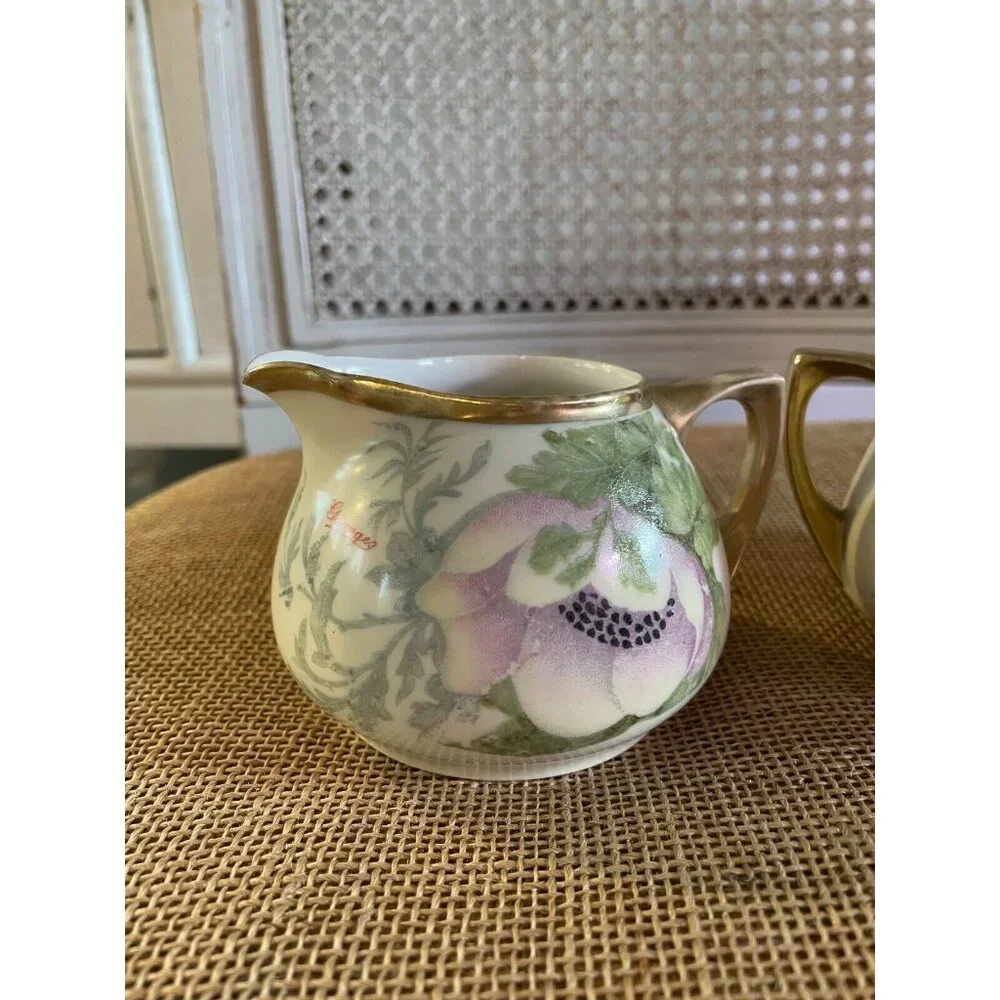 D & E.G. Royal Austria Handpainted Artist Signed Purple Floral Creamer & Sugar